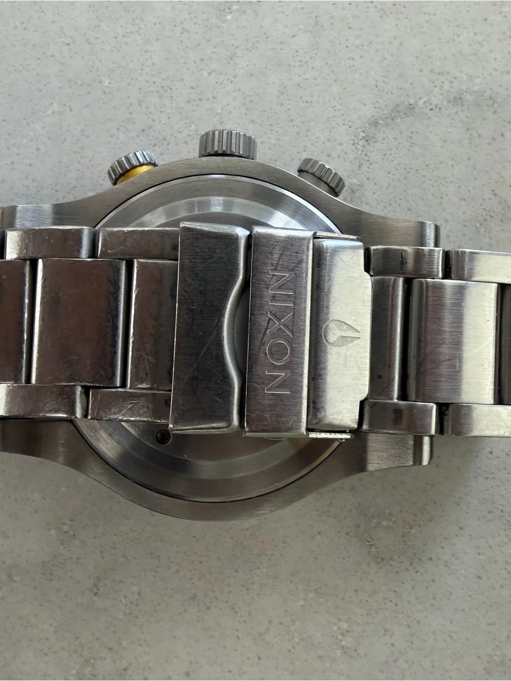 Nixon Stainless Steel Chronograph Watch — Black Dial with Yellow Accents